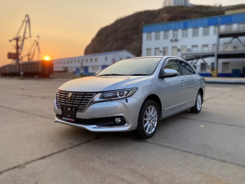Toyota Premio T260 на фоне заката