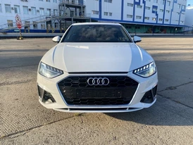 Audi A4 B9 пятое поколение 2018 белый цвет кузов вид спереди фары