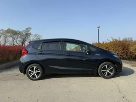 Honda Fit 2018 GP5 гибрид синий кузов вид сбоку