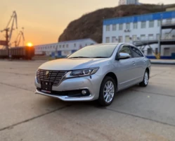 Toyota Premio T260 на фоне заката