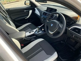 BMW 118i салон руль обшивка